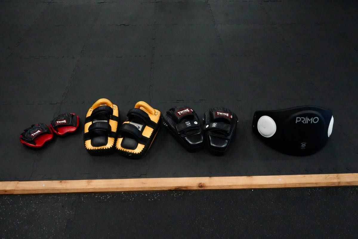 Training pads laid out on a gym mat